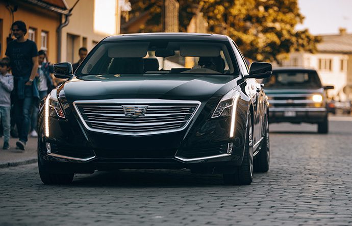 Carey International luxury transportation services in Italy featuring scenic Italian landscapes and premium chauffeured vehicles.